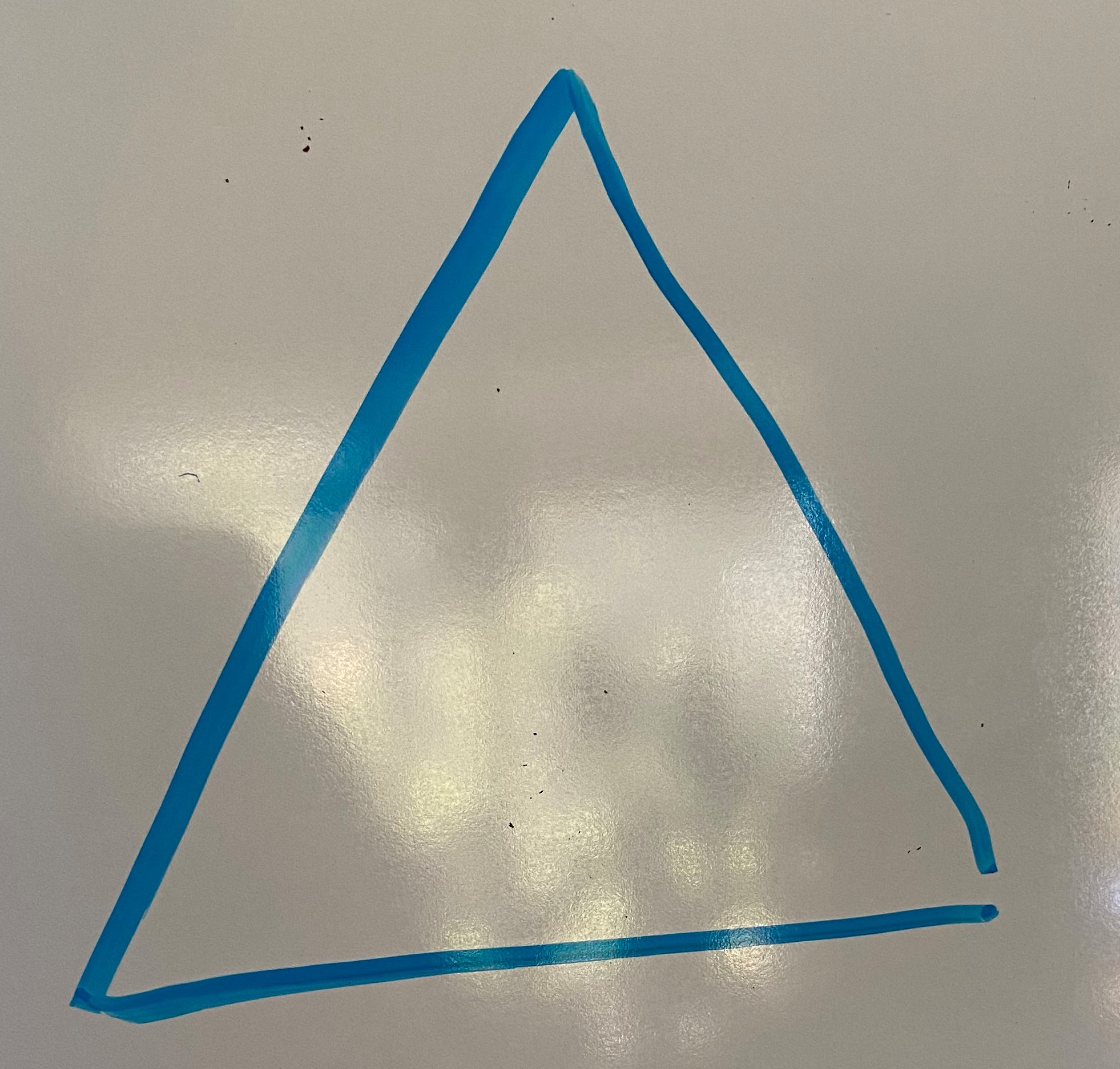 drawing on a whiteboard of a triangle